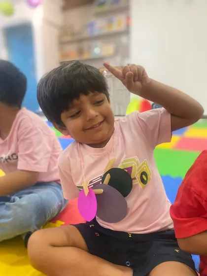 That "I got it!" moment. A student's happy expression shows his excitement during a learning game. We make sure that education feels like a joyful discovery.