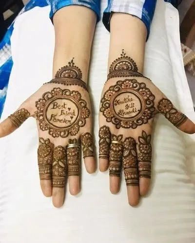 A fun design for a bride's best friend. One palm says "Best Friend Forever" and the other has "Kritika ki Shaadi," celebrating friendship during a wedding.