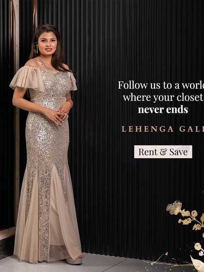 Shine bright in this fully sequined silver mermaid gown. The off-shoulder design with ruffled sleeves adds a touch of modern romance, making it a perfect rental for a glamorous cocktail evening.