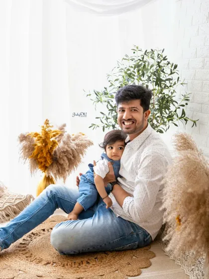 A candid moment of a father and his little one sharing a hug. These natural, unposed shots are often the most treasured from a family session.