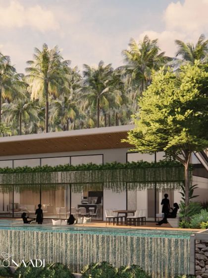 The wooden deck at the Pai Residence features an integrated dining area and steps leading down into the infinity pool. This design allows for a seamless transition between swimming, lounging, and dining, all while enjoying the tranquil river view.