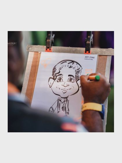 We can arrange for live entertainment like a caricature artist to add a fun and personal touch. Guests leave with a unique and humorous keepsake from the event.