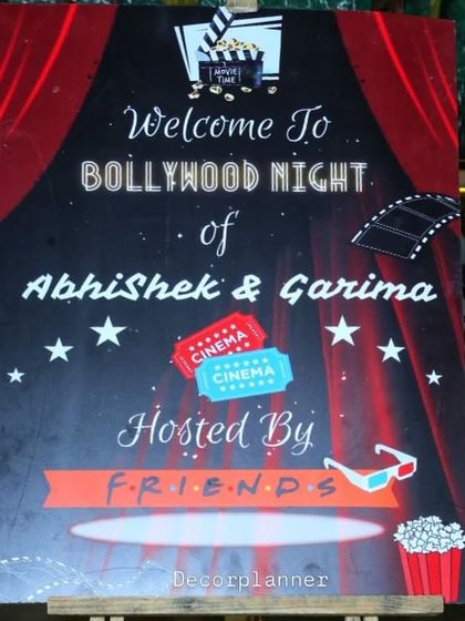 A personalized welcome sign for the "Bollywood Night" bachelorette party. The design incorporates movie tickets, film reels, and a classic cinema look to set the theme right from the start.