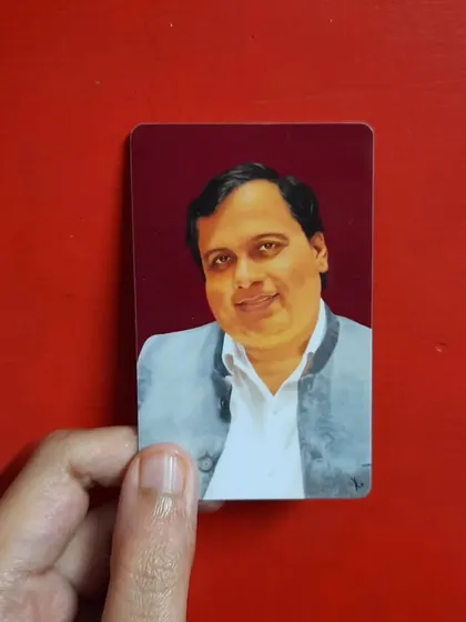 This is the front of a wallet card featuring a digital portrait I was commissioned to create. I work from your photo to capture the person's likeness and personality. The final product is a sturdy, credit card-sized keepsake.