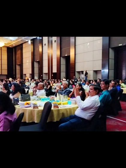 The audience at the Emerson awards ceremony. Corporate events like these are a great way to recognize employees, and I'm happy my art can be a part of that.