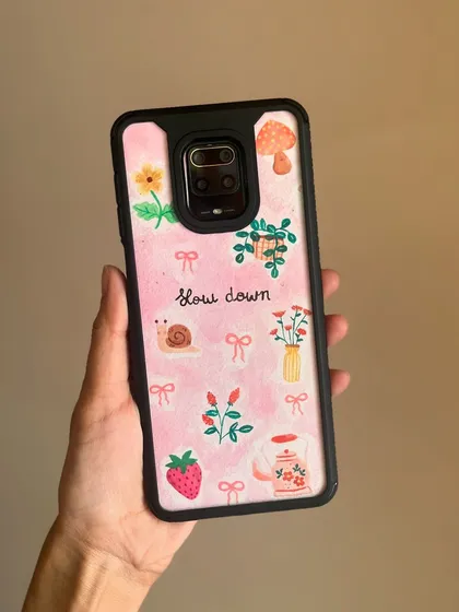 A hand-painted paper insert is a simple way to make your phone case unique. This "slow down" design is a gentle reminder to find calm in your busy day, filled with cozy, cottagecore doodles.