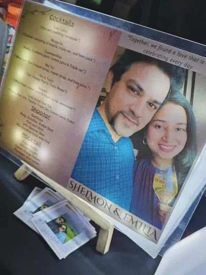 Our custom LED menu, personalized with a photo of the couple, Sheldon and Emilia. This is a unique touch we offer to make your event bar truly your own.