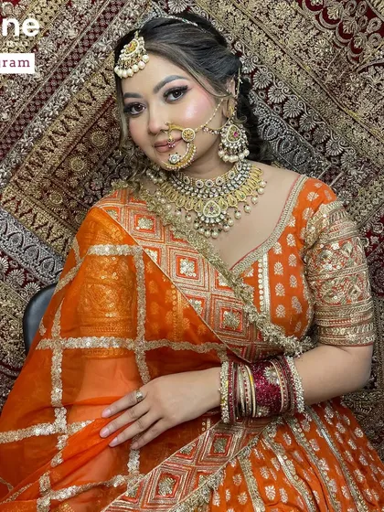 This image shows how to balance a bright outfit with makeup that is both glamorous and refined. Color theory is a fundamental part of my makeup curriculum.
