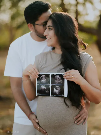 The first hello. Incorporating your baby's sonogram into the photoshoot is a beautiful way to make them part of the story from the very beginning. This is one of my favorite moments to capture during a pregnancy announcement shoot.