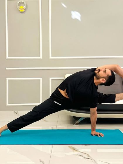 Visvamitrasana is an advanced pose that combines a deep side-body stretch, a hamstring opener, a twist, and an arm balance all in one.