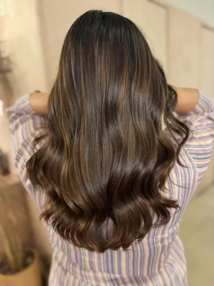 A closer look at the 'Rich Roast' color, showing the seamless blend of highlights and lowlights. This non-bleach technique creates a multi-dimensional brunette look.