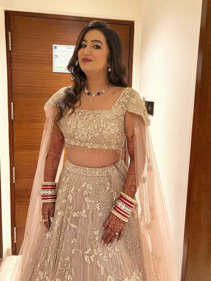 This bride is all smiles, ready for her reception party. The makeup is designed to last all night while looking fresh and beautiful.