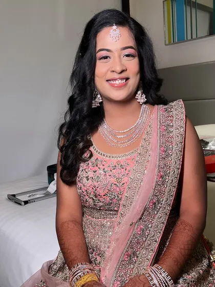 My stunning bride Ritu, who traveled from Bangalore for her engagement makeup. I created a soft pink-toned look to match her lehenga, with glowing skin and defined eyes.