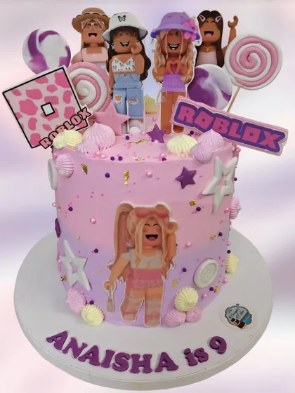 A Roblox-themed cake for a 9th birthday. This design is perfect for a girl who loves the game, featuring popular avatars and a pink and purple color scheme.