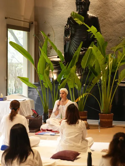Leading a workshop in a beautiful, serene space. My role is to guide you, but the transformation comes from your own practice and presence.