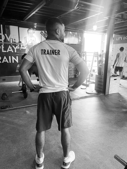 A shot from the gym floor. My focus is always on the client and their progress, ensuring every session is productive, safe, and moves you closer to your goals.