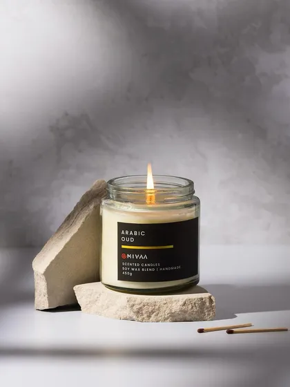 The studio's lighting and moody backdrops are perfect for creating atmospheric product shots, like this one for a scented candle, that feel both elegant and intimate.