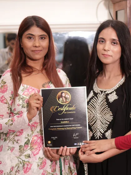 Presenting the certificate to Sahira. Her dedication was truly inspiring.