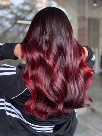 A full back view, capturing the entire scope of this stunning red hair transformation.