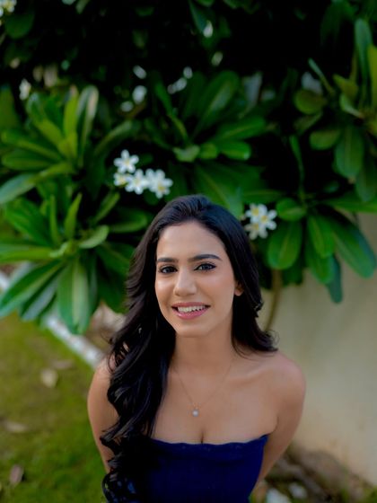 A smiling close-up portrait, showing a natural and approachable look.