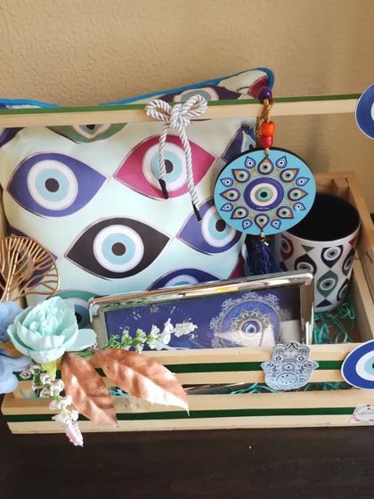 A still image of the evil eye hamper, showing all the coordinated blue and white items that make this theme so popular and visually appealing.