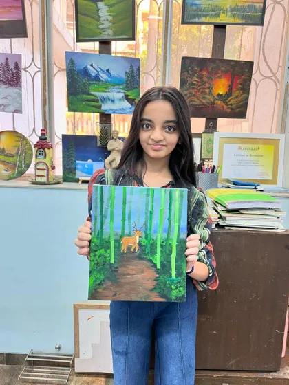 We explore so many fun and unique styles in my class. This student is showing off her beautiful forest scene, created using a special Blurr Technique on canvas that gives the painting a dreamy, atmospheric feel.