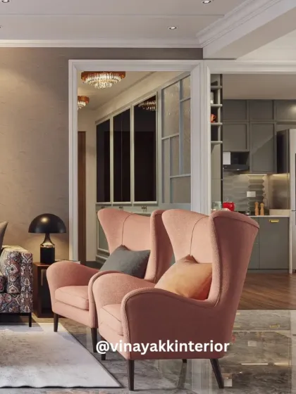 This shot shows the seamless transition from the living area to the kitchen. The consistent color palette and flooring create a sense of openness, while the distinct furniture styles define each functional zone.