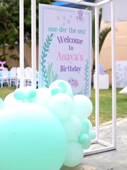 This duplicate of the welcome sign shows the attention to detail in creating a cohesive and immersive themed experience from the moment guests arrive.