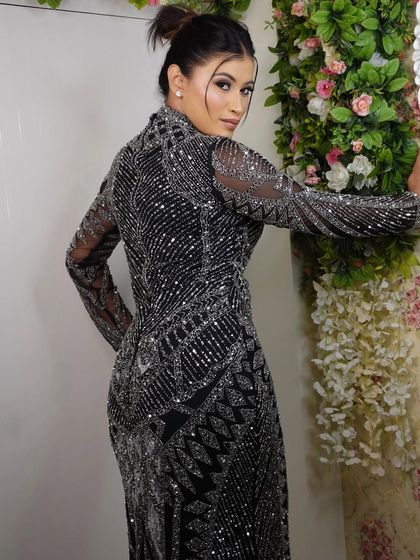 The back of this gown is as stunning as the front. The updo ensures that all the beautiful details of the dress are visible.