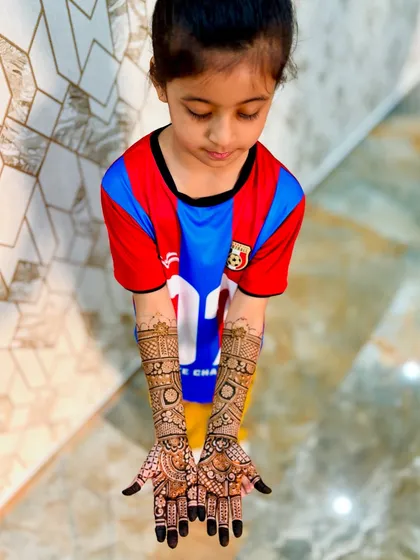 Mehendi is for everyone, including the little ones. This young client was thrilled with her full-hand design, and I always use 100% organic henna that is completely safe for children's sensitive skin.