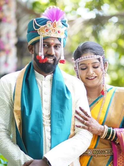 Another sweet, candid moment. The bride's makeup is designed to look fresh and natural, even in bright outdoor lighting.