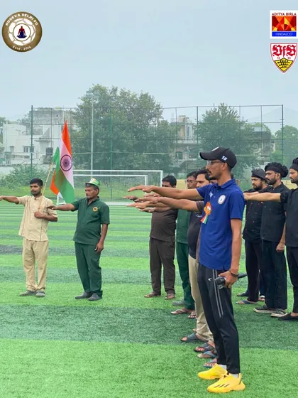 Our staff taking the pledge on Independence Day. We are united in our mission to serve the nation through football.