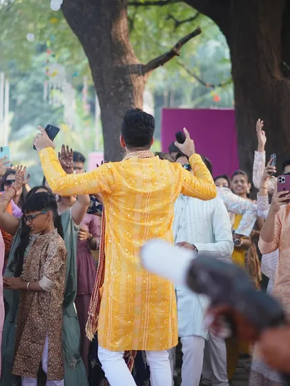Getting everyone involved in the celebration. A view from the back shows how I engage with the entire audience.