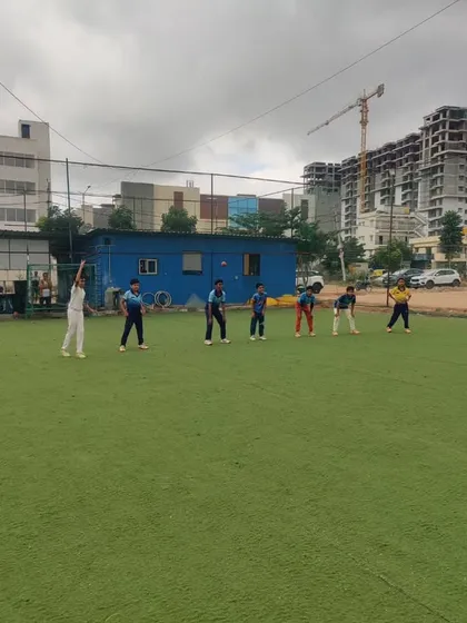 A coach hitting catches to the U-10 group. We use a variety of drills to keep the sessions interesting and effective.