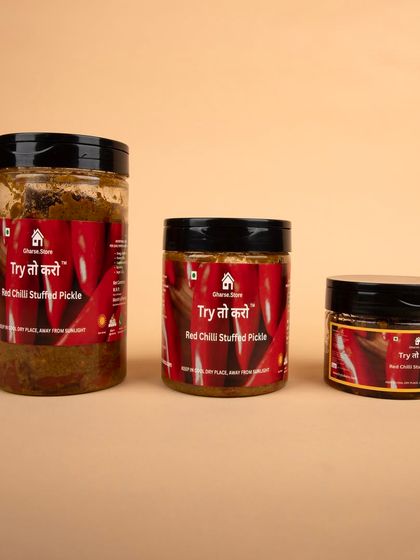 A shot of all three sizes of the Red Chilli Stuffed Pickle.