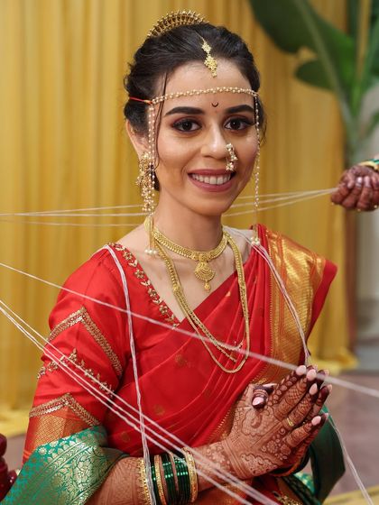 The bride participating in a wedding ritual. My makeup application is designed to be durable and withstand all the emotional and happy moments of the day.