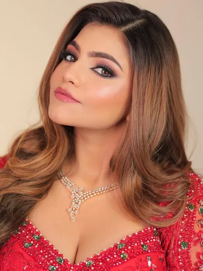 A close-up of the soft smokey eye and glowing skin. This is a timeless glam look that will never go out of style.