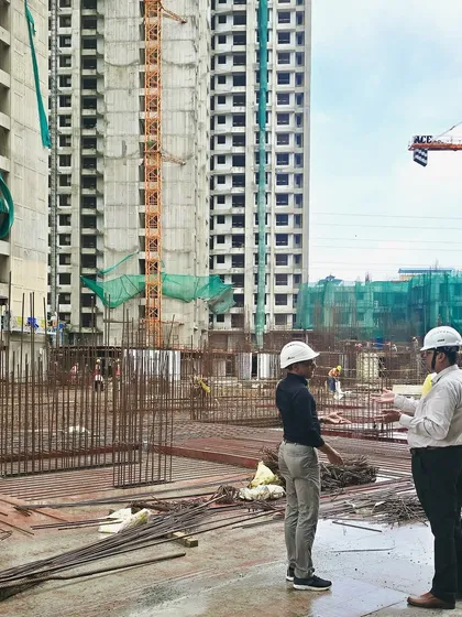 On-site discussion with my team at the residential township project, ensuring the design vision is executed with precision.