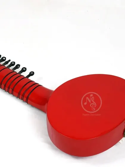 Another view of the back of the red Zitar, showing the strap button for playing while standing.