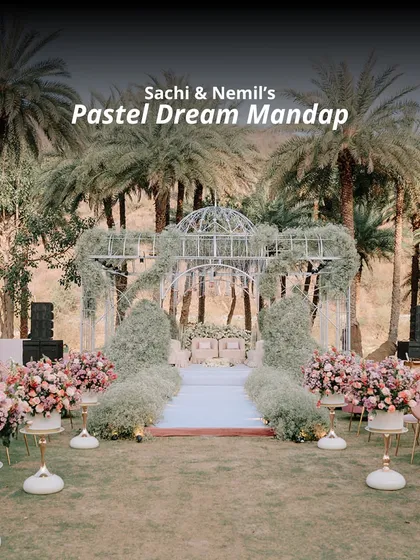 For Sachi and Nemil, we designed this Pastel Dream Mandap. Set against a backdrop of lush palm trees, this ethereal structure of delicate greenery and pastel florals created a serene and romantic sanctuary for their vows.