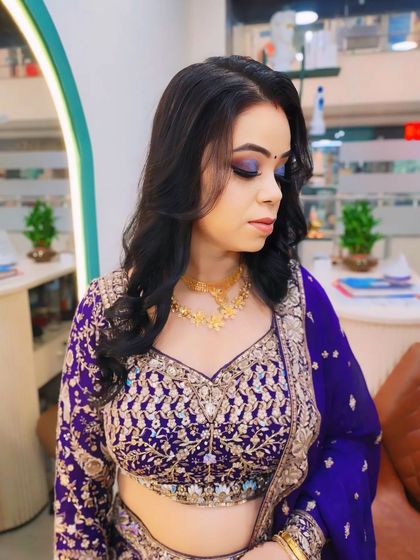 A detailed look at the purple smokey eye makeup, which was the highlight of this party look. I blended multiple shades to create this dimensional effect.