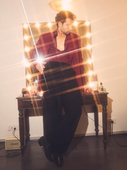 For the Pinkvilla Style Awards, I put Siddhant Chaturvedi in a custom Manish Malhotra look. The rich burgundy jacket and flared trousers create a dramatic, 70s-inspired silhouette.