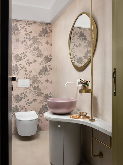 Splashes of lilac and grey, adorned with touches of brass. I designed this whimsical sanctuary for a child's bathroom, where every splash creates a canvas of childhood tales and happy memories.