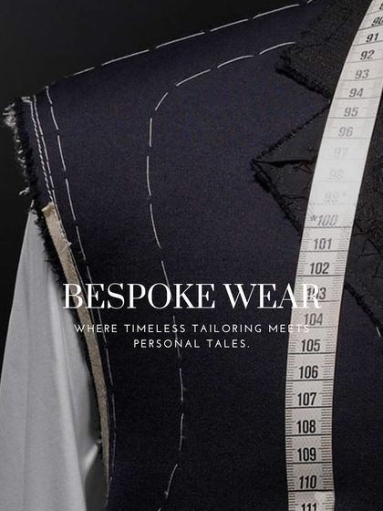 A suit jacket in its early stages, with a measuring tape draped over the shoulder. This image represents the meeting point of personal tales and timeless tailoring.
