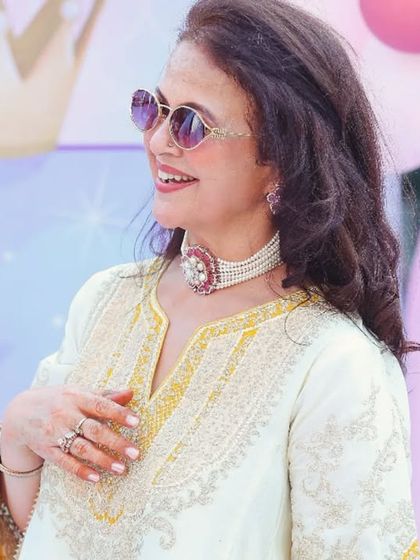 A stylish guest enjoying the birthday festivities. I capture photos of friends and family to give you a complete memory of who was there to celebrate with you.