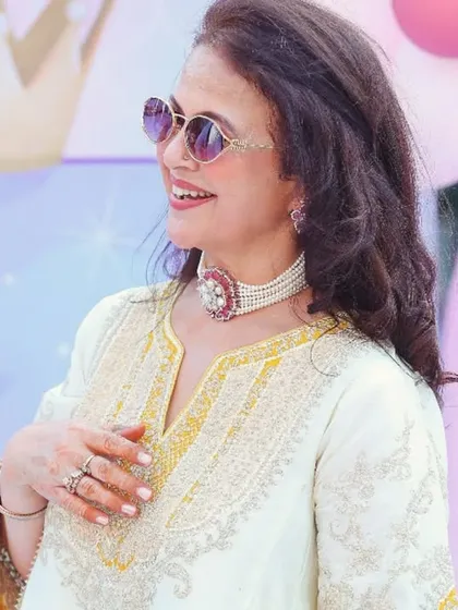 A stylish guest enjoying the birthday festivities. I capture photos of friends and family to give you a complete memory of who was there to celebrate with you.