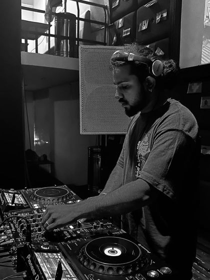 These shots capture me in my element, from different angles and at various events. Each one is a glimpse into my life as a music maker, focused on the craft and connecting with the crowd.