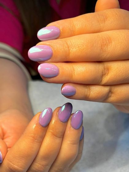 Soft, subtle, and oh-so-lovely in lilac. This aura nail design features a beautiful blend of purple shades for a delicate and dreamy manicure.