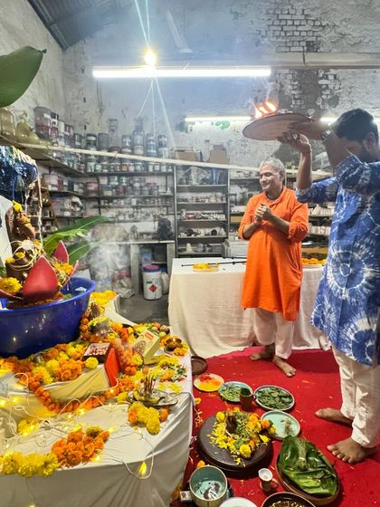 A member of our community performing the evening aarti. These daily rituals during the festival are an important part of our shared celebration.