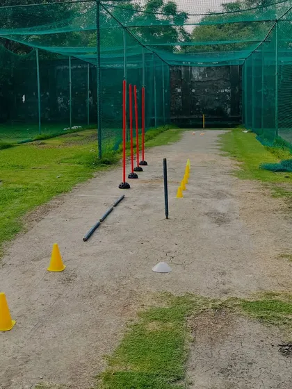 The practice pitch is set. Using cones and poles helps a bowler visualize their line and length, and forces them to maintain discipline in their action.